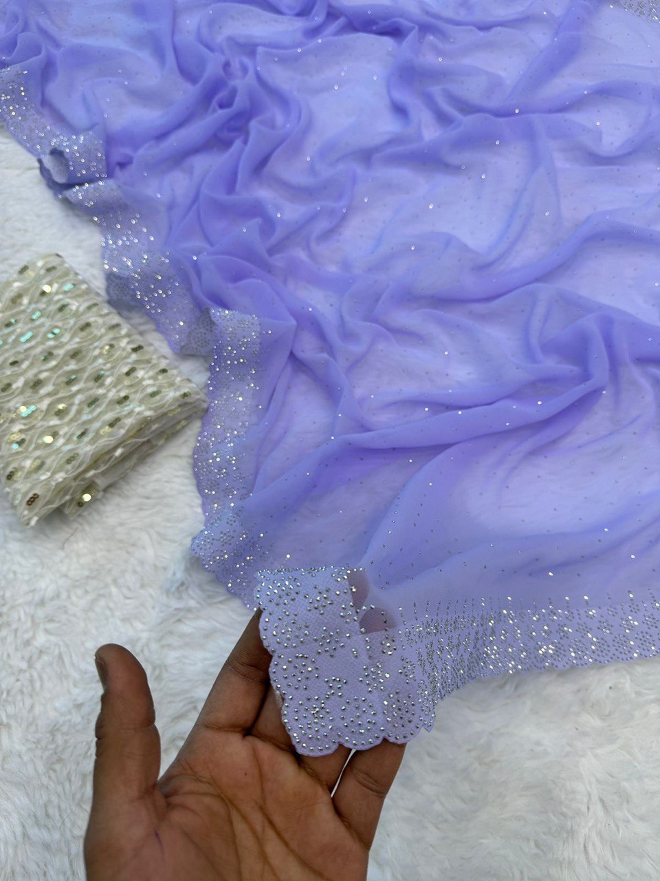 Lavender colour Faux Georgette saree with diamond work