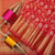Ideal Red-Orange Colour Traditional Looking Silk Saree